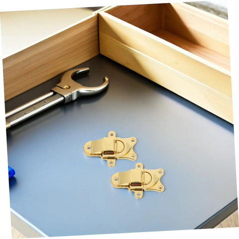 Premium 2pcs Vintage Toggle Latch Set For Boxes. Durable Zinc Alloy Golden Metal Hasp Locks Secure Tool Chest Trunk Gear. Super Cool Antique Finish Fits Any Old School Cabinet Or Jewelry Case Perfect For Heavy Duty Projects And Handy Home Repairs Today. pair of gold zinc alloy toggle latches on box lid