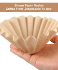 Hand holding brown basket-style coffee filter, Bulk 100 Count One To Four Cup Disposable Coffee Filters Natural Brown Unbleached Basket Style