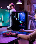 Person gaming with Compact 60 Percent Mechanical Gaming Keyboard Featuring Silky Linear Red Switches And Detachable Type C Cable.
