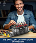 Man assembling Dope Aircraft Carrier Engine Building Set With Inline Six Cylinder Motor Realistic Military Aviation Engine Model Kit
