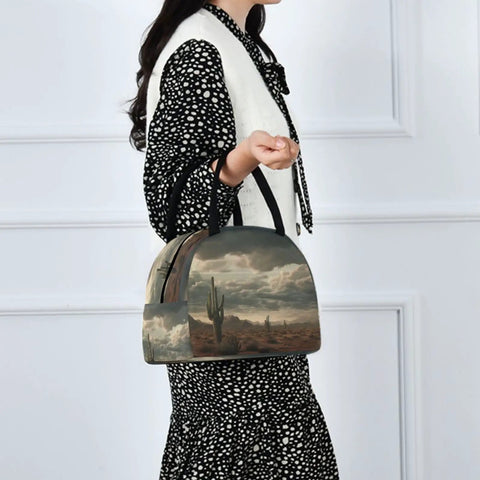 Desert Cactus Insulated Lunch Bag For Women And Men With Fashion Print held by person, showcasing desert scene print and black handle.