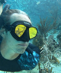 Diver wearing Aluma Pro Freedive Mask With Dope Anti Fog Technology, Ultra Low Volume For Freediving Snorkeling And Scuba, black with tinted lens.