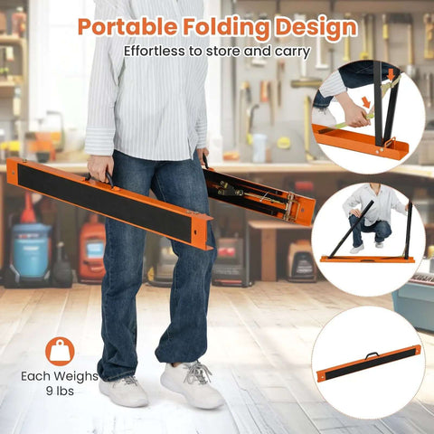 Person carrying Beefy Saw Horses 2 Pack Portable Galvanized Metal Work Stand With Non Slip Top folded for transport