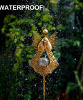 Angel Stake Solar Lights With Crackle Glass Globe Waterproof Warm White LEDs, shown in rain, 40.5 Inch metal bronze garden stake.