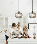 Bottom Line Quality Clear Marble Glass Pendant Lights 2 Pack Hand Blown Globe Hanging Lamp For Kitchen Island in stylish kitchen.