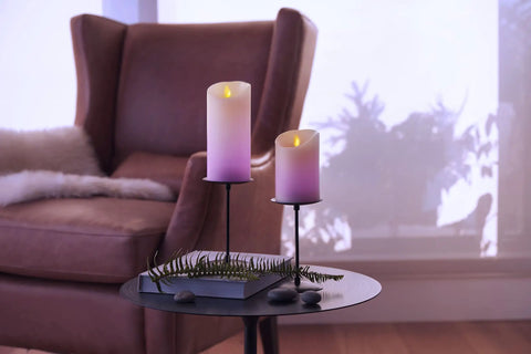 Flameless Color Changing LED Candle Pillar 3 By 4.5 Inches With Real Wax Moving Flame on living room table