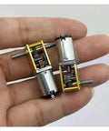 Beefy All Metal Gearbox DC Motor With Long Shaft For N20 Slow Speed High Torque Worm Gear shown in hand for scale