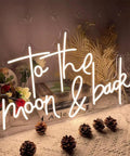 To The Moon And Back LED Neon Light Sign With Adjustable Brightness Flexible Silicone Neon Strip on decorated table