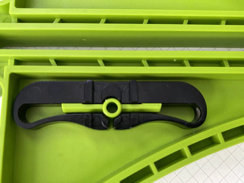 Close-up of Portable Saw Featherboard Crafted For 5/8 Or 3/4 Slot With Rock Solid Eva Foam, showing black and green components.