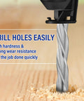 Close-up of a drill bit in use, part of the 18 Piece Drywall And Cutting Drill Bit Set For Wood Plastic And Drywall