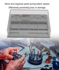 Watch Parts Organizer And Movement Tray With Dust Cover Handy Repair Box for Screw Parts and Tools, shown on workbench.