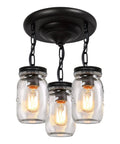 Dope 3-Light Glass Mason Jar Pendant Lights For Kitchen Island farmhouse style with black round metal canopy and lit bulbs