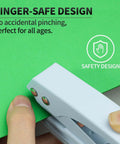 Heavy Duty 1/4 Inch Single Hole Paper Punch For Crafts And Office Use showing finger-safe design on green paper