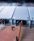 Close-up of a Top Shelf Rectifier Diode from the 100 Piece Assortment Kit for AC to DC conversion on a fingertip.