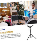 Portable Folding Snare Drum Stand With Heavy Duty Alloy Frame Multi Angle Adjustable Metal Mount Detachable Practice Rack For Drummers Black Design Is Built Tough And Straight Up Ready For Any Gig in use during band practice.