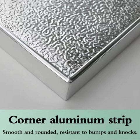 Corner detail of Heavy Duty Fireproof Heat Shield Board For Refrigerators And Stoves showing silver aluminum texture.