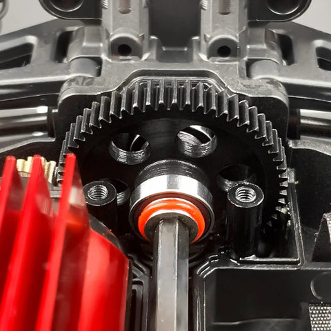 Close-up of Beefy Steel Main Gear 0.5M 57T 59T RC Spur Gear in metal housing for Arrma and Losi RC models.