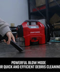 Plug And Play Three In One Portable Air Compressor Tire Inflator And Car Vacuum With Knockout 160 Psi Pressure And Quick Blast 20k Rpm Blower in use for debris cleaning.