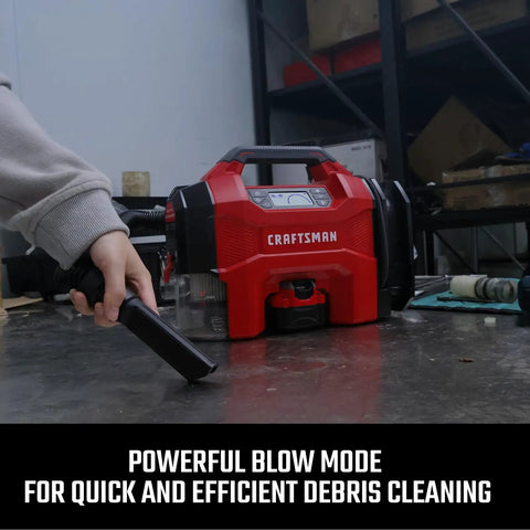 Plug And Play Three In One Portable Air Compressor Tire Inflator And Car Vacuum With Knockout 160 Psi Pressure And Quick Blast 20k Rpm Blower in use for debris cleaning.