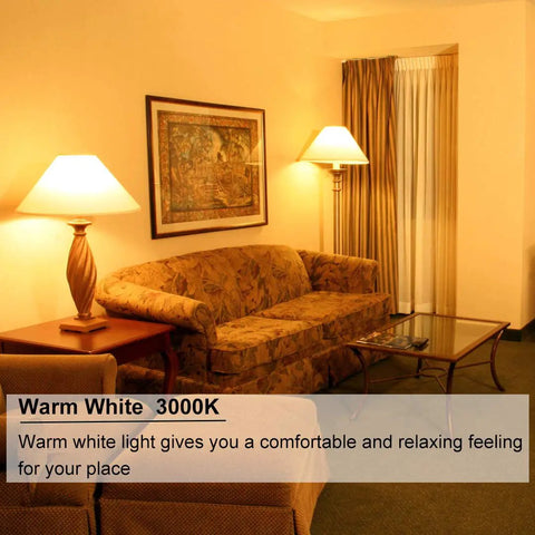 Warmly lit living room with Two Pack E12 LED Candelabra Bulbs, 400 Lumens, 4W, 3000K Warm White, creating a cozy atmosphere.