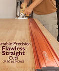 Top Shelf 50 Inch Aluminum Straight Edge Cut Guide For Circular Saw Router And Jigsaw with a rigid edge on a workbench.