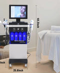 All In One Hydrogen Oxygen Facial Skin Care Machine With 10.4 Inch Touch Screen For Home And Office Use next to spa table