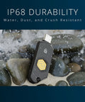 Zero Drama Dual Mode Usb C Security Key With Nfc Tap Feature For Seamless Passwordless Login Supports Fido2 Protocols And Modern Passkeys Across Every Device You Own Keychain Ready on wet stones, showcasing IP68 waterproof design.