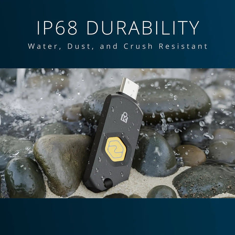 Zero Drama Dual Mode Usb C Security Key With Nfc Tap Feature For Seamless Passwordless Login Supports Fido2 Protocols And Modern Passkeys Across Every Device You Own Keychain Ready on wet stones, showcasing IP68 waterproof design.