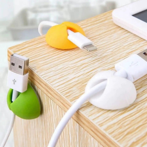 6 Pack Desk Cable Organizer Clips For Wire Management Adhesive Cord Holders installed on desk holding USB cables