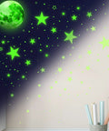 1086 Piece Glow In The Dark Stars And Moon Wall Decals Set For Ceiling And Walls Solar System Galaxy Kids Bedroom Living Room Green Cool Night Sky Decor Create Any Shape displayed on a wall.