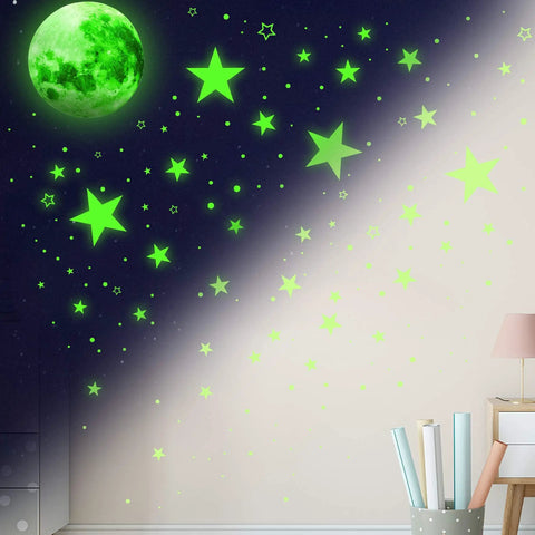 1086 Piece Glow In The Dark Stars And Moon Wall Decals Set For Ceiling And Walls Solar System Galaxy Kids Bedroom Living Room Green Cool Night Sky Decor Create Any Shape displayed on a wall.