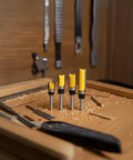 Top Tier 4 Pc Flush Trim Router Bit Set With 1/4 Inch Shank And Bearing Carbide Blades For Wood Edge Forming Trimming Grooving Pattern Work A Total Game Changer For Any Serious Woodworking Pro Looking To Nail Every Cut Clean on a wooden workbench.
