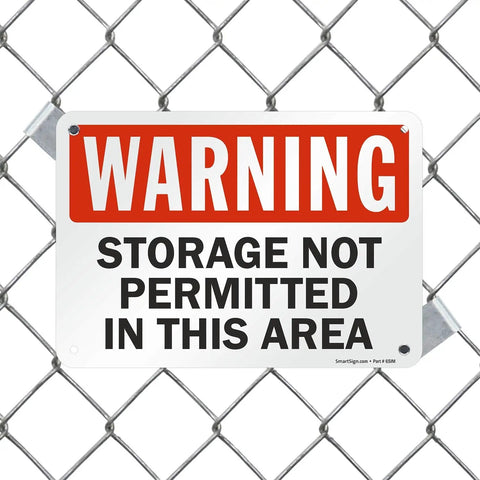 Heavy Duty Warning Sign For No Storage Zones Built Tough As Nails With Smooth Rounded Edges For Safe Handling Made From Durable Recyclable Plastic That Handles Indoor Warehouse Jobs And Outdoor Weather Like A Pro Delivering Clear Safety Alerts Daily mounted on chain link fence.