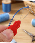 Gourd Shaped Plastic Needle Threader For Hand Sewing And Embroidery, Portable Threading Tool With Smooth Thread Insertion For DIY Crafts, Sewing Machines, Quick And Easy No Fuss Needle Passing, red plastic close-up