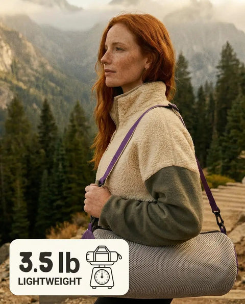 Person holding Capy Ultralight Camping Chair For Backpacking And Festivals, 3.5 lb bagged, showing lightweight portability