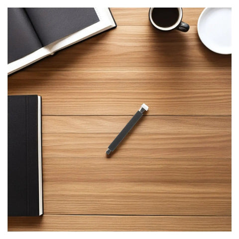 Plastic Bearing Roller Pinch Feed Shaft For Barcode Label Printer Replacement Part on a wooden desk with notebooks and coffee