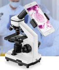 Kid Friendly Microscope Kit For Kids And Adults 100X To 2000X Compound Microscope with smartphone display holder in lab setting.