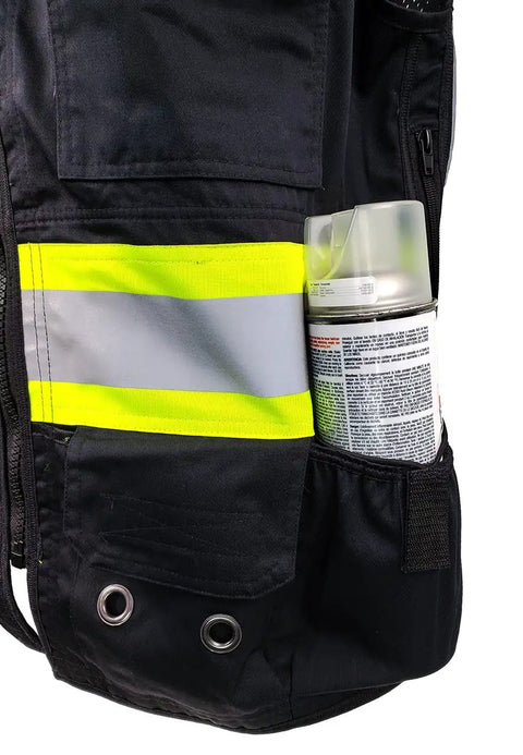 Pro Level Ansi Class One Safety Vest For Surveyors In Matte Black with high vis trim holding a spray can in pocket.