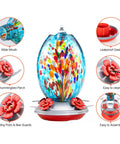 Blown Glass Hummingbird Feeder With 27 Oz Capacity For Outdoor Garden Decor Includes Ant Moat And Cleaning Brush Blue Fireworks Accent A Mom Friendly Gift For Women And Nature Lovers The Go To Backyard Bird Watching Accessory.