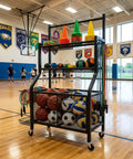 Heavy Duty Rolling Storage Rack And Athletic Gear Cart With Mesh Shelves Iron Frame For Gym Basement Garage Setup, filled with sports balls and cones.
