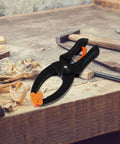 A-Type Quick Release Ratchet Spring Clamps 2-Pack for Woodworking and Photography Backdrop Cloth Clips on workbench