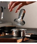 No Drama 2 In 1 Coffee Tamper And Constant Pressure Espresso Distribution Tool With Calibrated Spring above a portafilter.