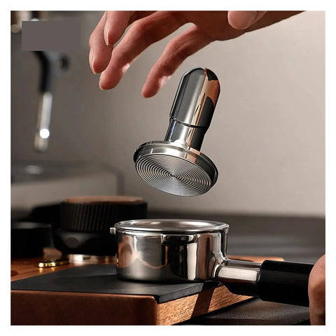 No Drama 2 In 1 Coffee Tamper And Constant Pressure Espresso Distribution Tool With Calibrated Spring above a portafilter.