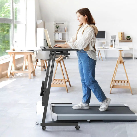 Small Standing Desk On Wheels For Treadmill Workouts with laptop, adjustable height design in a modern office setting.