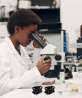 Scientist using microscope, Adjustable Plastic Tubing Clamps Set Of 5 For Water Flow Control And Hose Shut Off Clips pictured.
