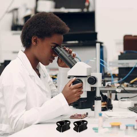Scientist using microscope, Adjustable Plastic Tubing Clamps Set Of 5 For Water Flow Control And Hose Shut Off Clips pictured.