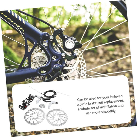 Top Tier Bike Disc Brake Rotors One Set Lightweight Aluminum Construction showing mounted rotors and calipers on a mountain bike.