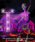 12 Ft Skeleton Lighting Kit With Remote LED displayed on skeleton with purple glow, house backdrop; skeleton not included.