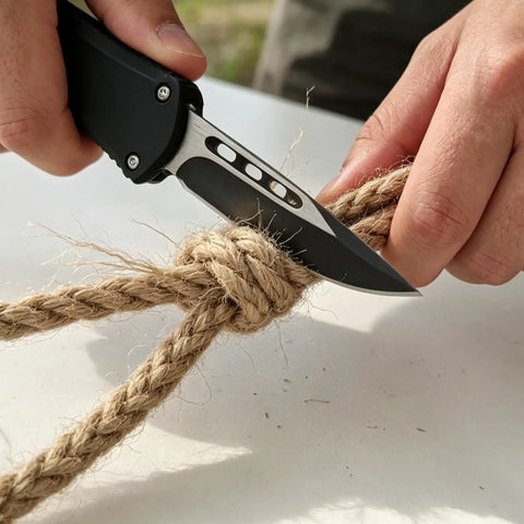 Everyday Carry Folding Knife For Outdoors With AUS10 Steel Blade cutting rope, showcases rust resistance and sharpness