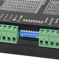 Close-up of Knockout CNC Digital Microstep Driver DM542 connectors and switch settings for stepper motor controller.